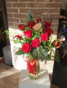 Deluxe Dozen roses in a vase